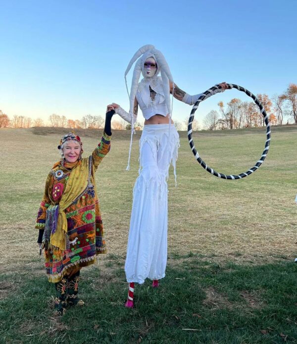 stilt walker Charlene Johnston with Abigail Adams Greenway